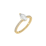 This yellow gold ring is made with a pear solitaire diamond set in three-prong setting, and is complemented by a round pave diamonds band in 3D view