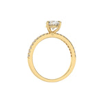 This yellow gold ring is made with a pear solitaire diamond set in three-prong setting, and is complemented by a round pave diamonds band in through finger view