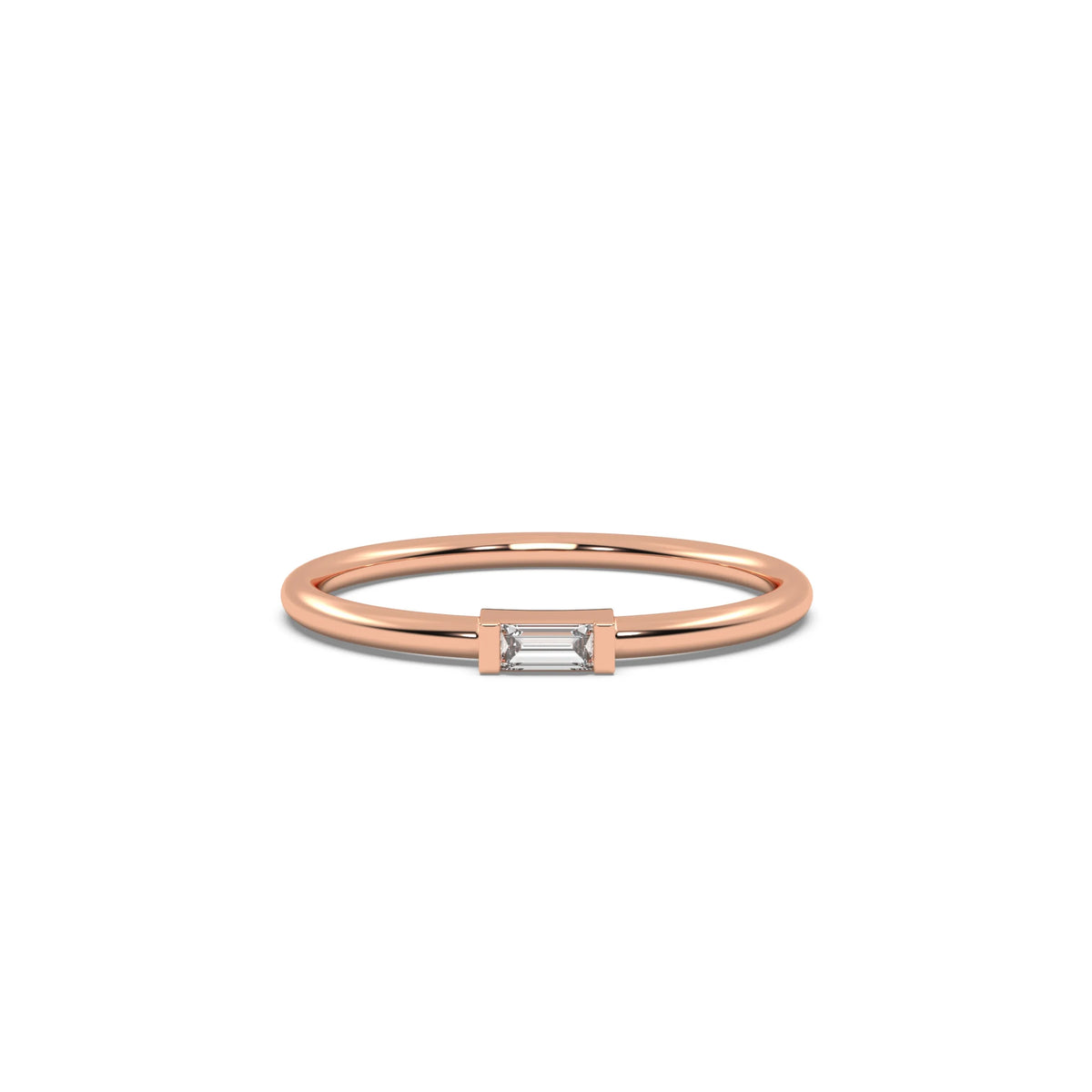 This rose gold A thin gold band showcases a baguette diamond held in a bar prong setting in top view