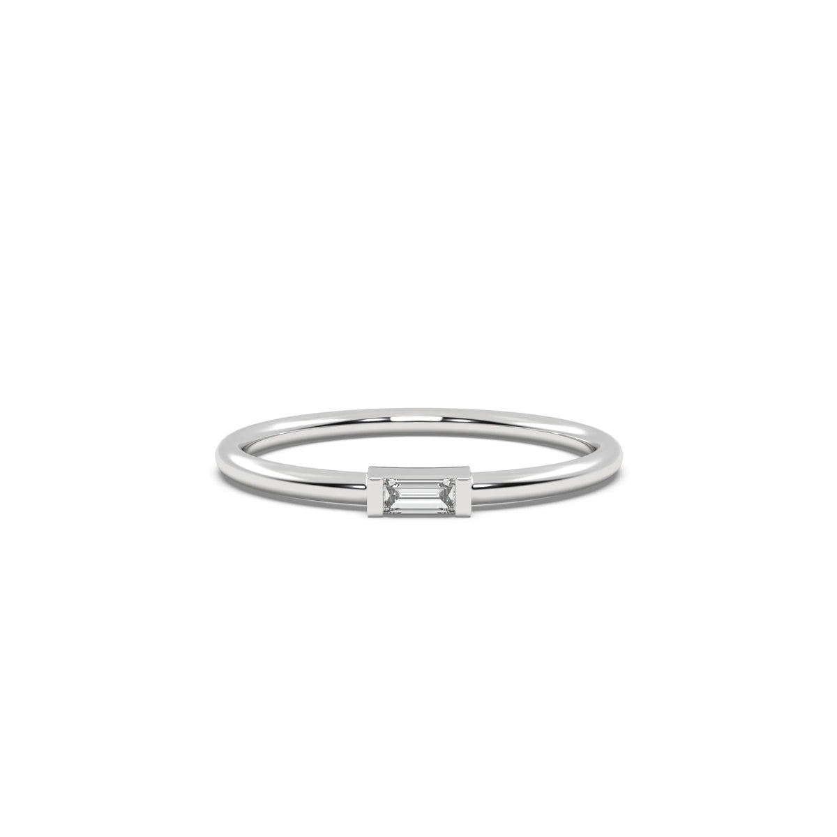 This white gold A thin gold band showcases a baguette diamond held in a bar prong setting in top view