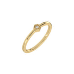 Thin yellow gold band with a round solitaire diamond in a hexagonal bezel setting in 3D view