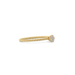 This yellow gold ring displayed in side view is made with a round diamonds in a cluster setting 