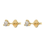 This yellow gold studs feature a classic round solitaire diamond in a three prong setting in side view