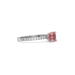 This White gold ring displayed in side view is made with a cushion solitaire diamond set in four-prong setting