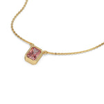 This yellow gold Fancy Pink Radiant Solitaire Diamond Necklace made with a fancy Pink radiant cut diamond in bezel setting with adjustable chain in 3d view