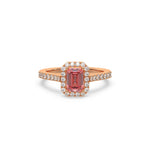 This rose gold ring displayed in front view is made with a Emerald solitaire diamond set in four-prong setting