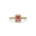 This yellow gold ring displayed in front view is made with a radiant solitaire diamond set in four-prong setting