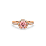 This rose gold ring displayed in front view is made with a round solitaire diamond set in four-prong setting