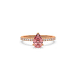 This rose gold ring displayed in front view is made with a Pear solitaire diamond set in four-prong setting