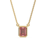 This yellow gold Fancy Pink Emerald Solitaire Diamond Necklace made with an fancy Pink emerald cut diamond in bezel setting with adjustable chain in top view