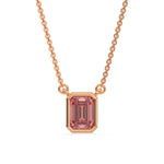 This rose gold Fancy Pink Emerald Solitaire Diamond Necklace made with an fancy Pink emerald cut diamond in bezel setting with adjustable chain in top view