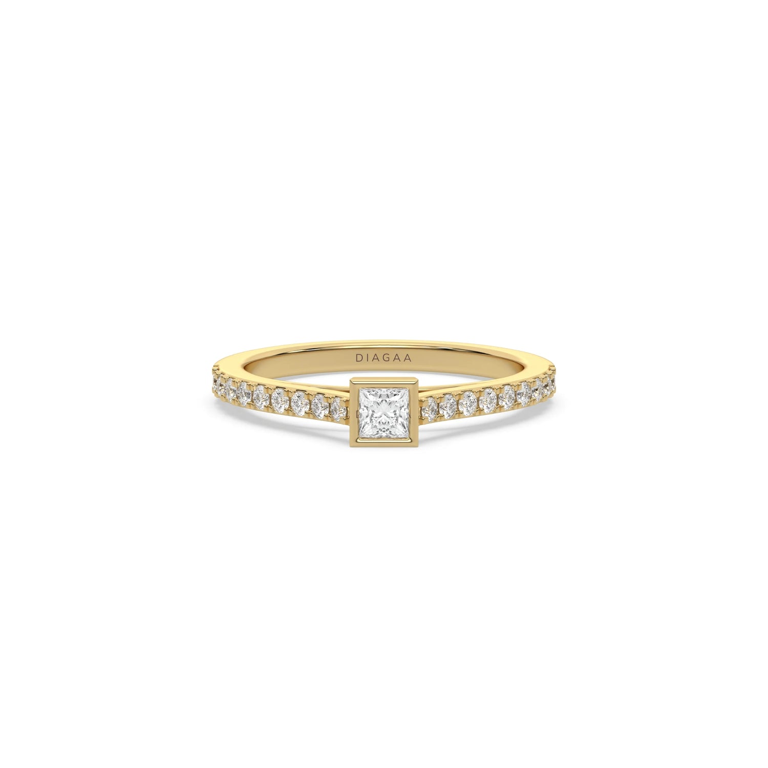 Princess-cut diamond engagement ring in a yellow gold bezel setting, featuring a shimmering pavé-set diamond band isolated on a clean white background.