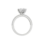 This white gold ring displayed in through finger view is made with a princess solitaire diamond set in four-prong setting