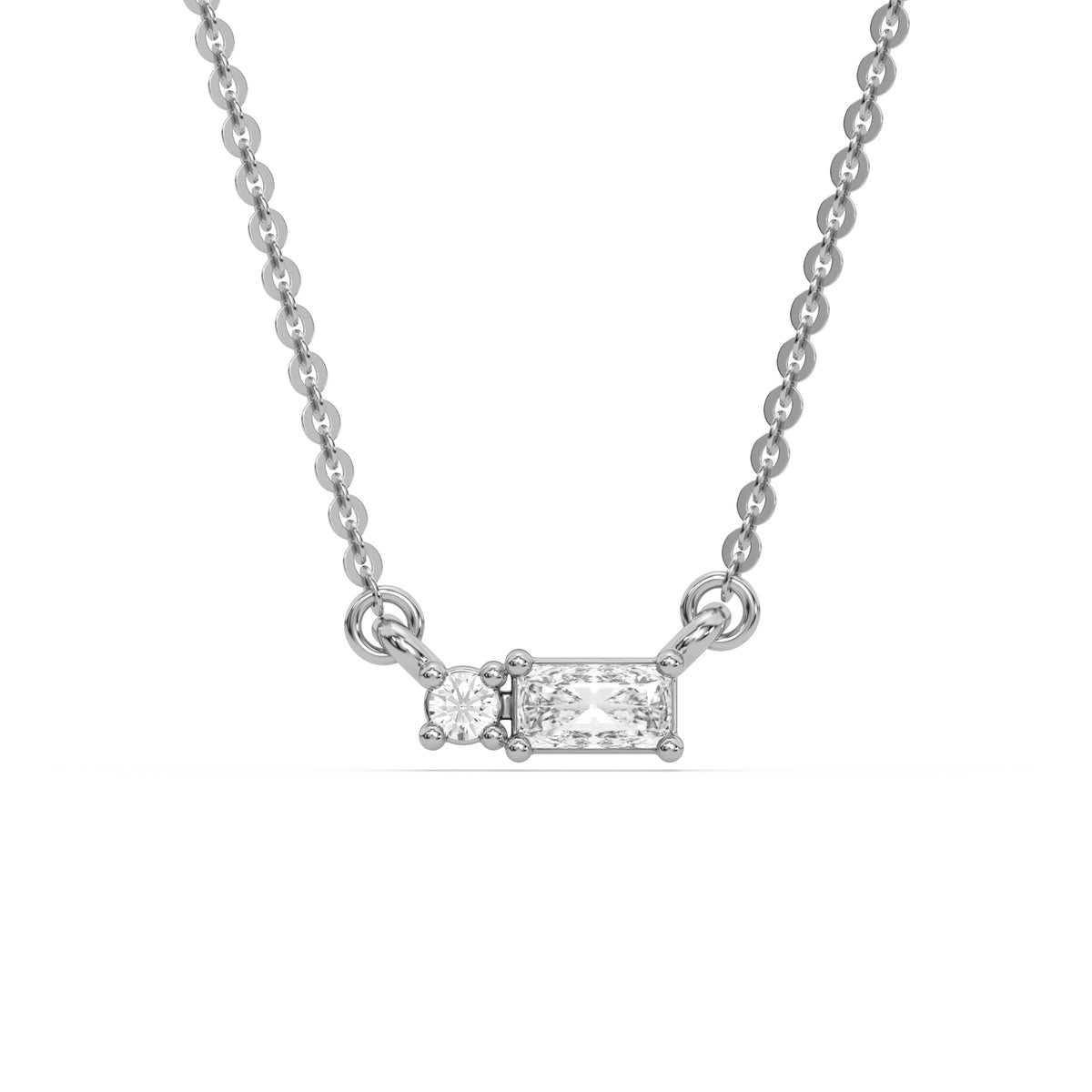 This white gold Cluster Diamond Necklace made with radiant and round diamonds, positioned right next to each other and securely set in prong setting in top view