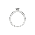 This white gold ring displayed in through finger view is made with a radiant solitaire diamond set in four-prong setting