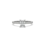 This white gold ring displayed in front view is made with a radiant solitaire diamond set in four-prong setting