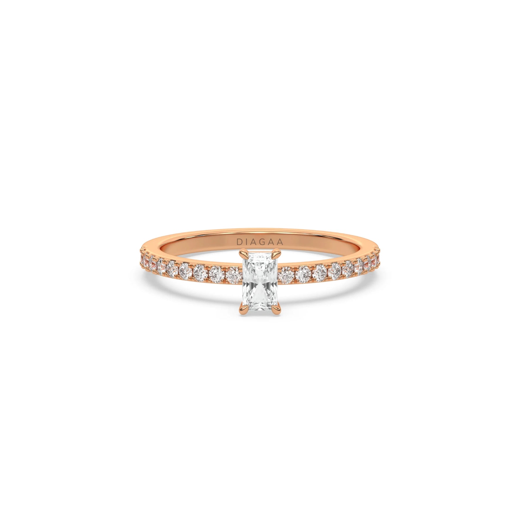 This rose gold ring displayed in front view is made with a radiant solitaire diamond set in four-prong setting