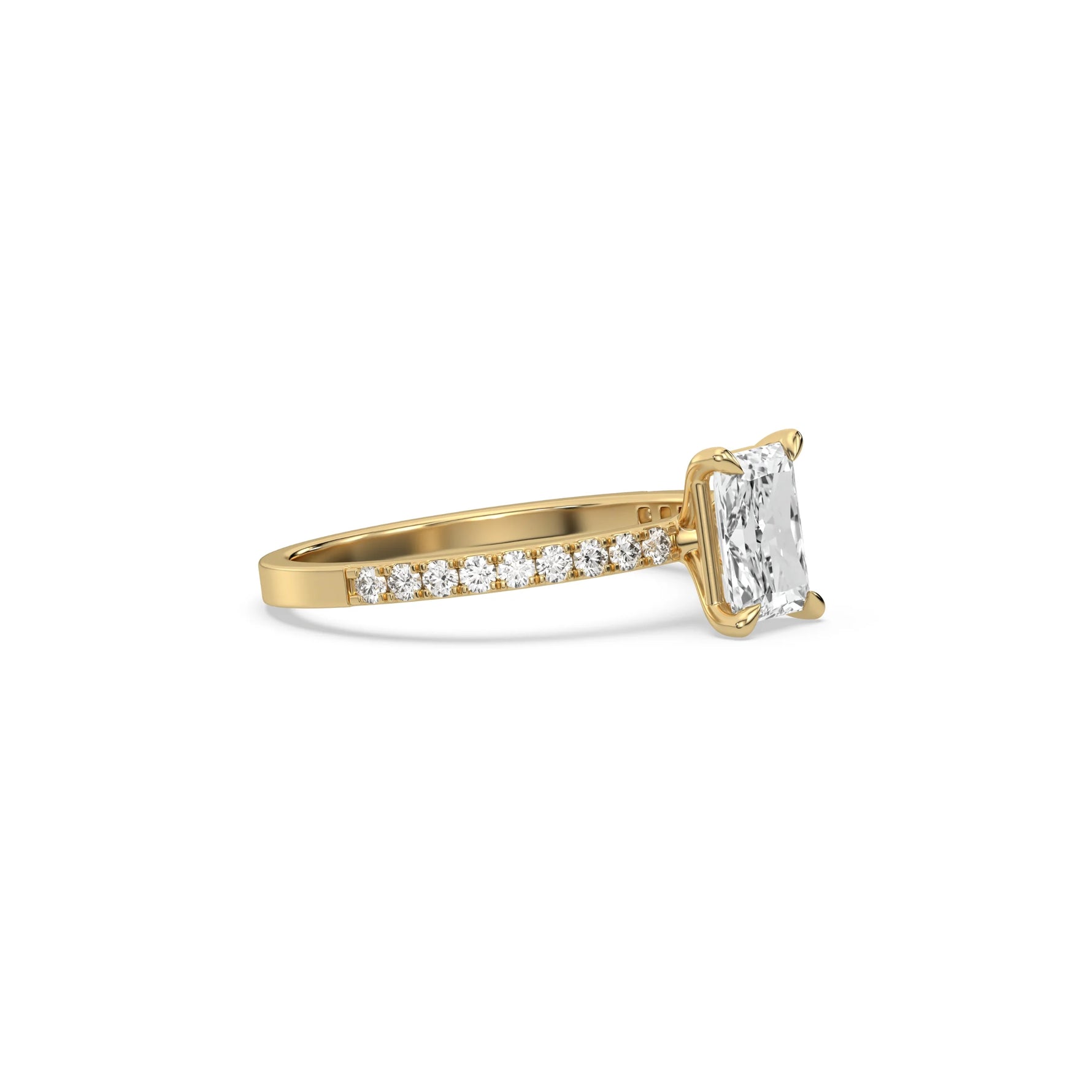 This yellow gold ring displayed in side view is made with a radiant solitaire diamond set in four-prong setting