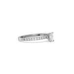 This white gold ring displayed in side view is made with a radiant solitaire diamond set in four-prong setting