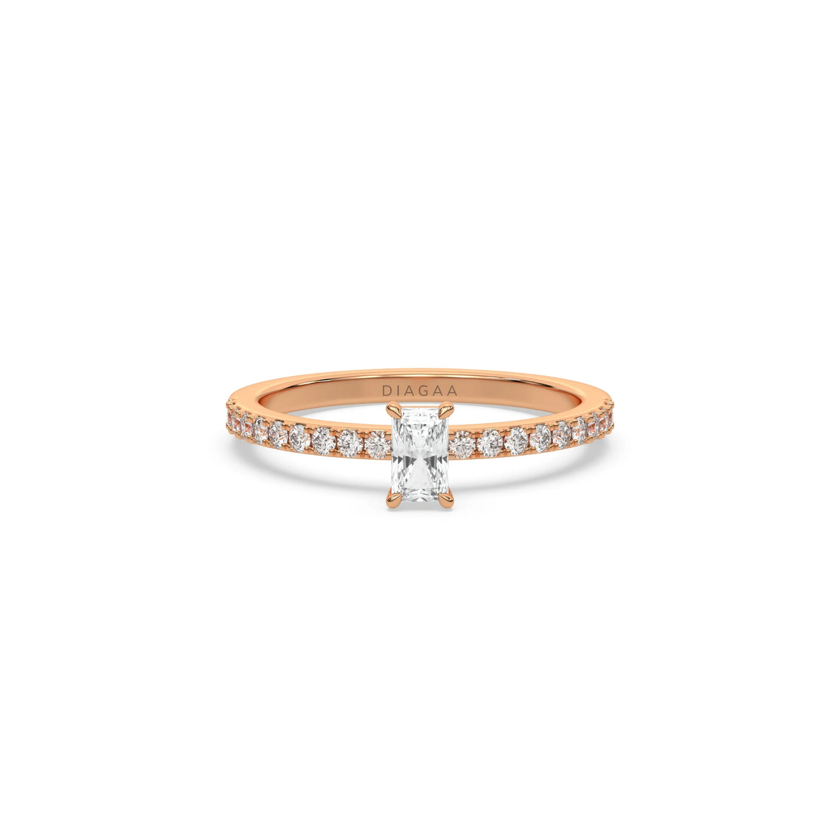 This rose gold ring displayed in front view is made with a radiant solitaire diamond set in four-prong setting