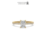 This yellow gold ring displayed in front view is made with a radiant solitaire diamond set in four-prong setting