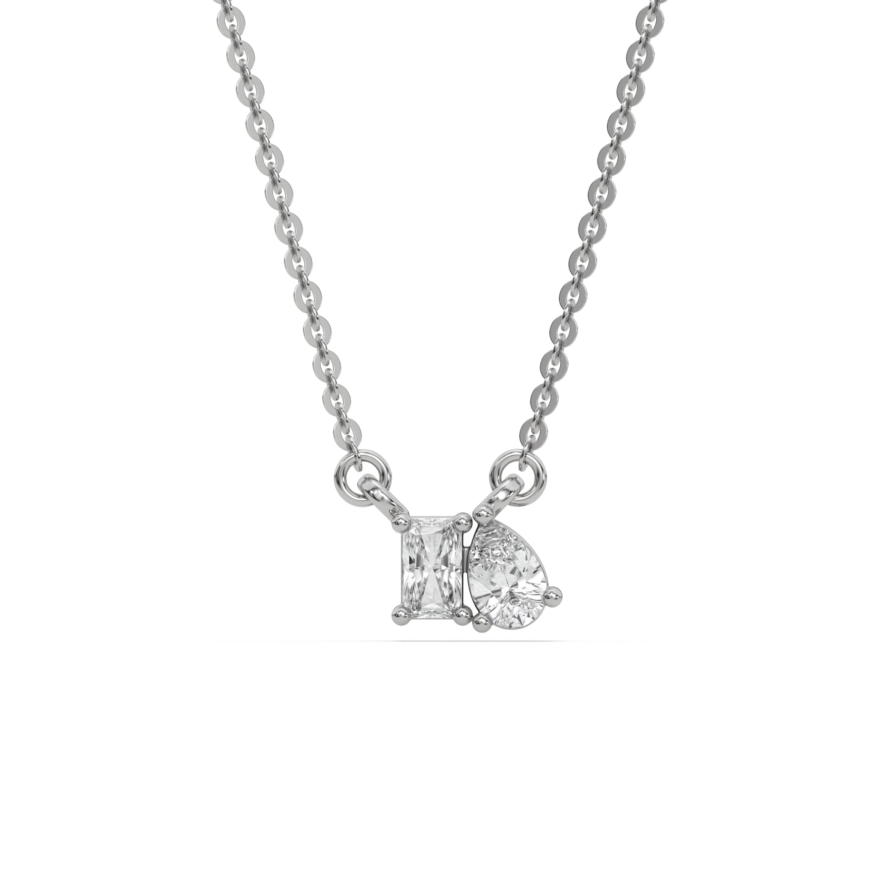 This white gold Cluster Diamond Necklace made with radiant and pear diamonds, positioned right next to each other and securely set in prong setting in top view