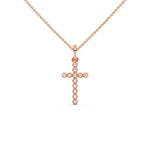 This rose gold Cross pendant made with 12 round diamonds, securely set in prongs in top view