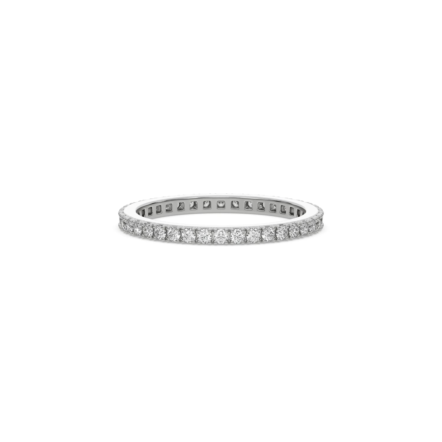 white gold diamond eternity band in featuring a continuous row of round-cut diamonds in a classic prong setting wedding band.