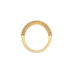 This yellow gold ring displayed on through finger view is made with brilliant round diamond set in prong setting