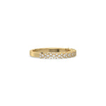 This yellow gold ring displayed on side view is made with brilliant round diamond set in prong setting