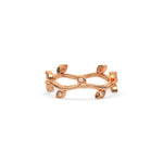 Dainty 14k rose gold leaf ring with a wavy vine band and round cut diamonds. Organic nature-inspired botanical wedding band jewelry for women.