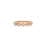 This rose gold ring displayed on front view is made with brilliant round diamond set in bezel setting