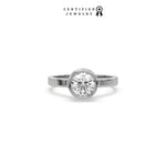 This white gold ring displayed on front view is made with brilliant round solitaire diamond set in bezel setting