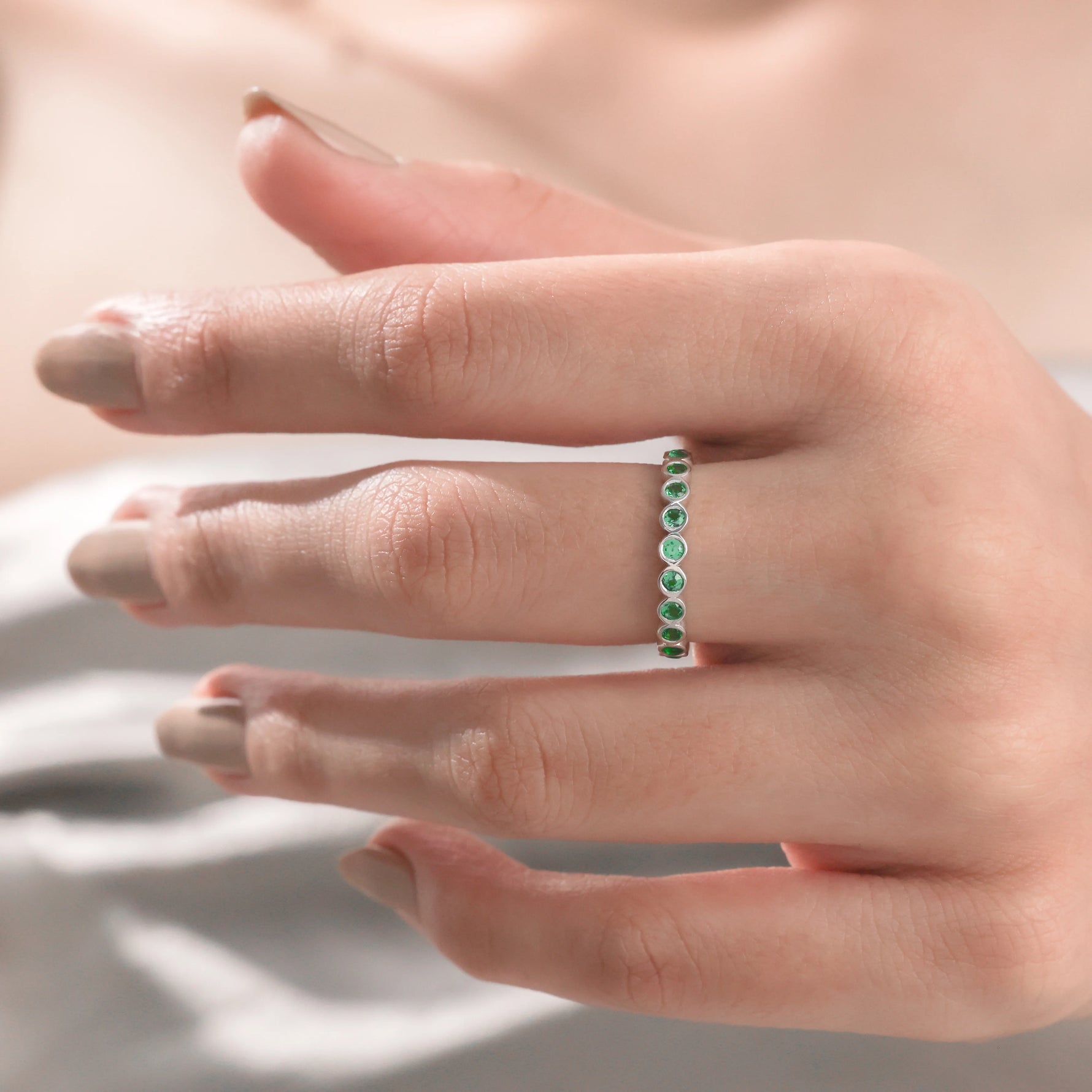 Round Bezel Set Emerald Eternity Ring 