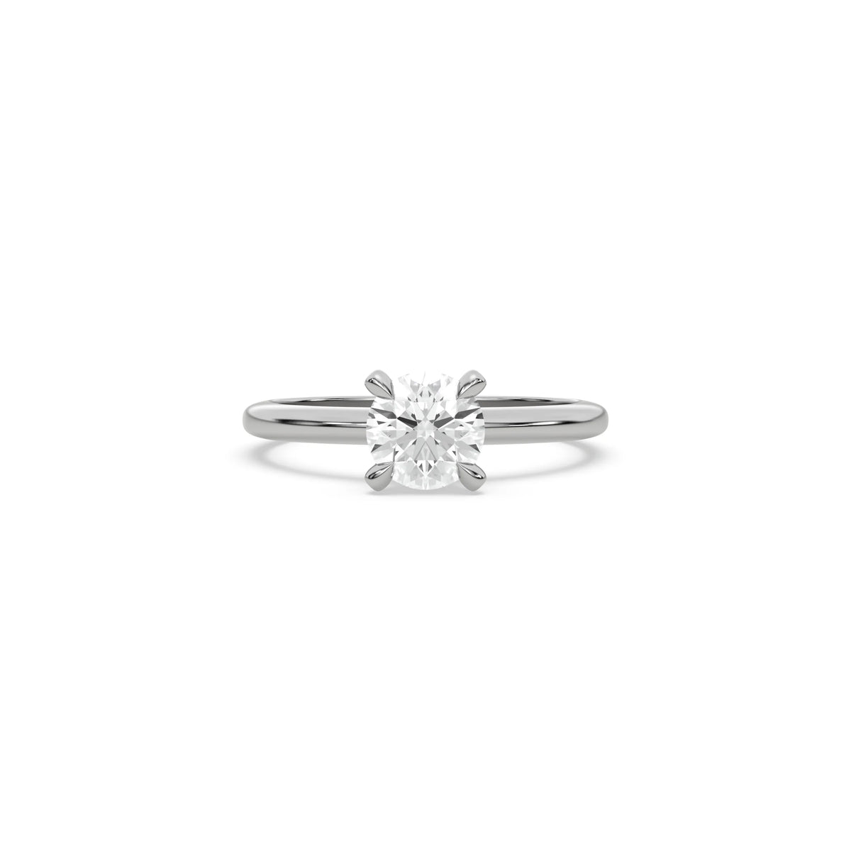 A minimalist white  gold engagement ring with a sparkling round diamond center stone on a slim, polished metal plain band.