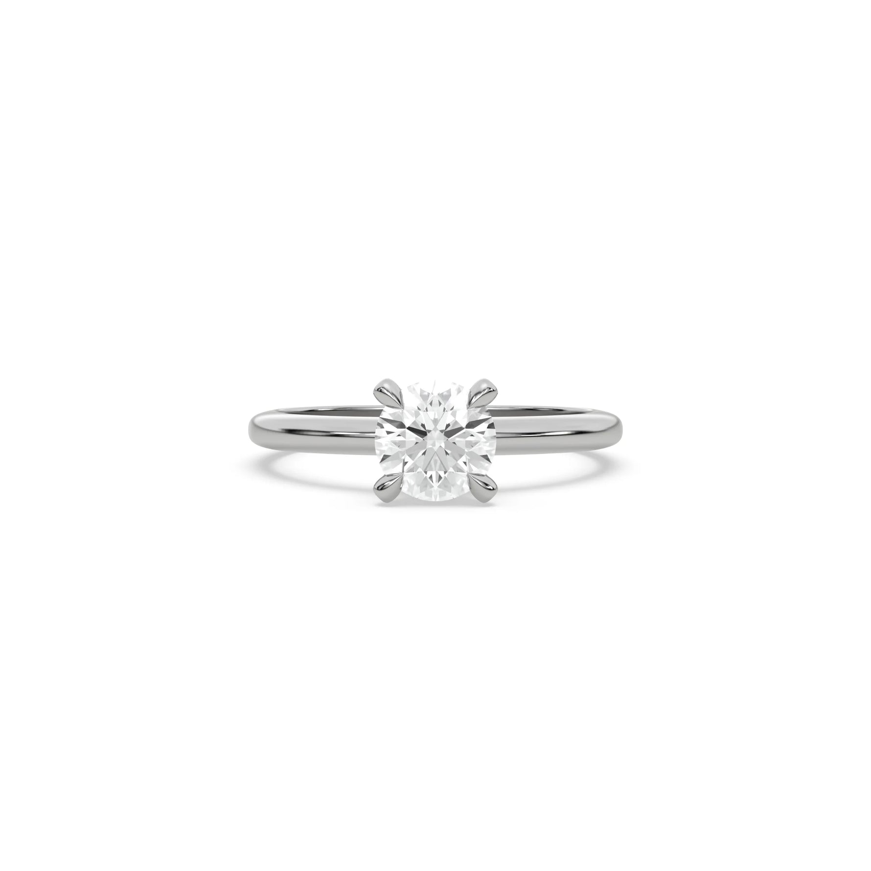 A minimalist white  gold engagement ring with a sparkling round diamond center stone on a slim, polished metal plain band.
