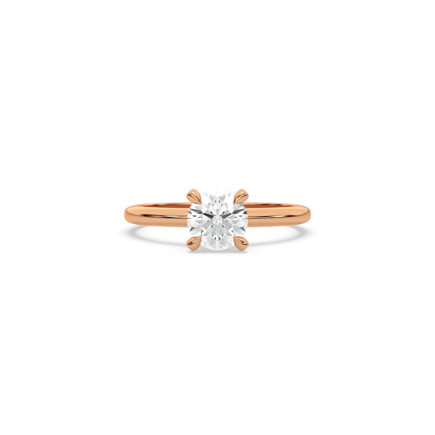 A minimalist rose gold engagement ring with a sparkling round diamond center stone on a slim, polished metal plain band.