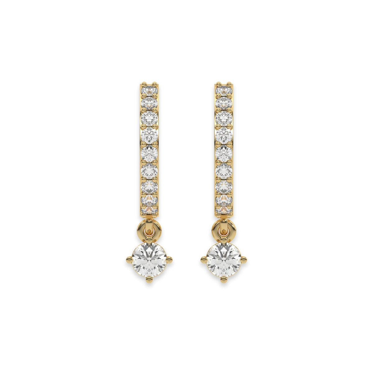 Solitaire round diamond dangling hoop earring set featuring a brilliant drop stone held in a yellow gold prong setting white background.