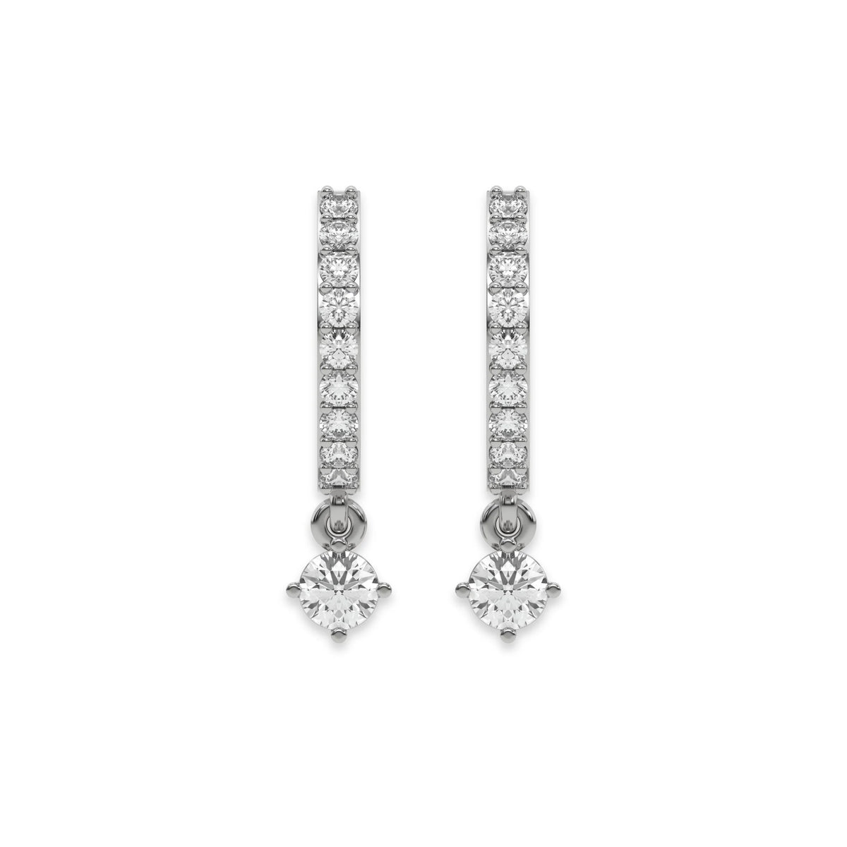 Solitaire round diamond dangling hoop earring set featuring a brilliant drop stone held in a white gold prong setting with white background.