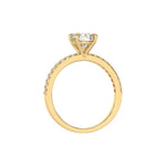 This yellow gold ring is made with a round solitaire diamond set in four-prong setting in through finger view