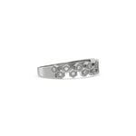 This white gold ring displayed on side view is made with  round brilliant-cut diamonds, each set individually in a hexagon bezel and arranged in a zig zag pattern