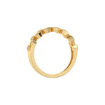 This yellow gold Zig Zag Round Diamond Ring handmade with round brilliant-cut diamonds, each set individually in a hexagon bezel and arranged in a zig zag pattern in through finger view