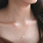 round and marquise diamond necklace in 14K gold