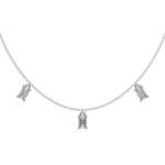 Emerald Dangling Diamond Necklace made with seven emerald cut diamonds each set in a prong setting, distributed evenly along the chain