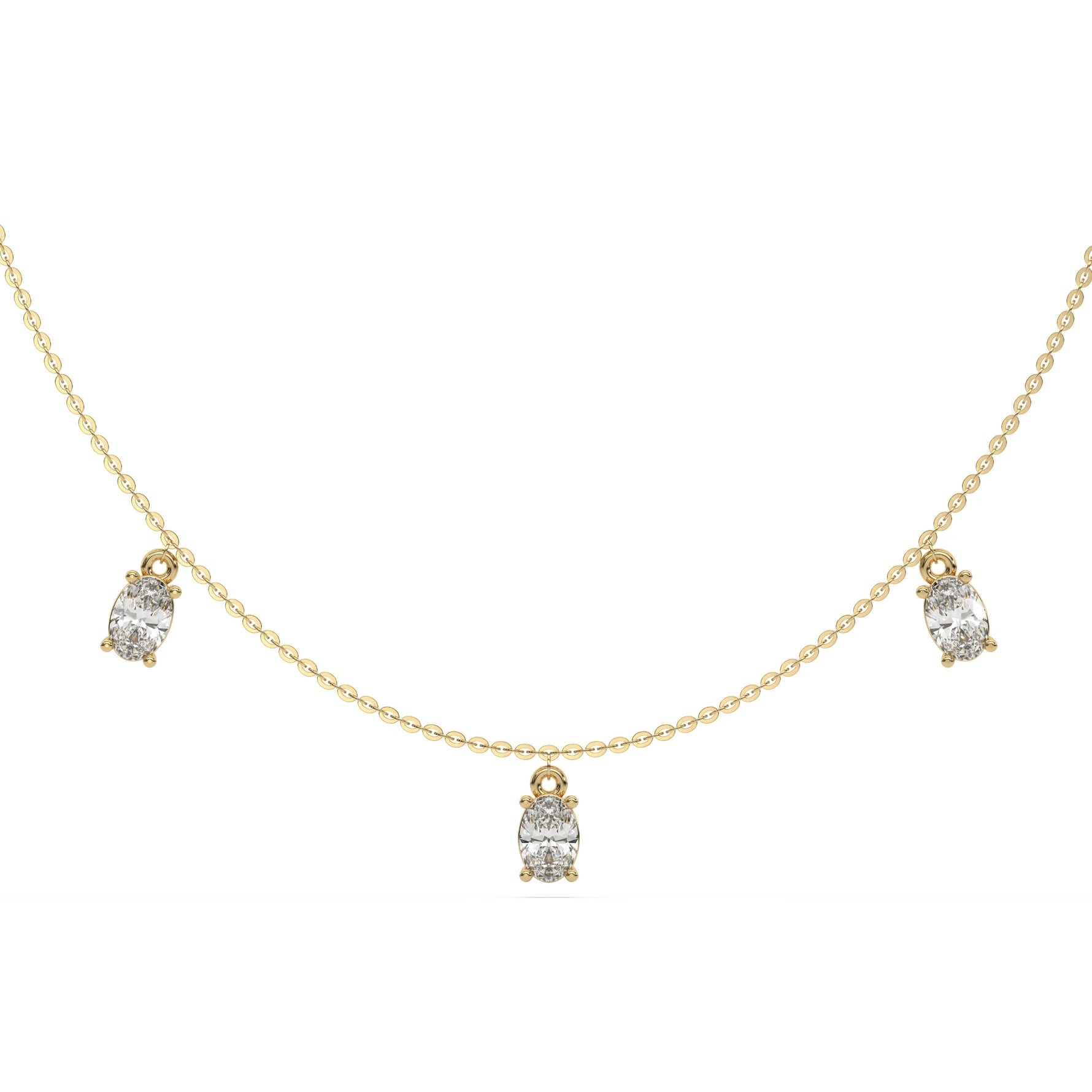 Oval Dangling Diamond Necklace made with seven oval cut diamonds each set in a prong setting, distributed evenly along the chain