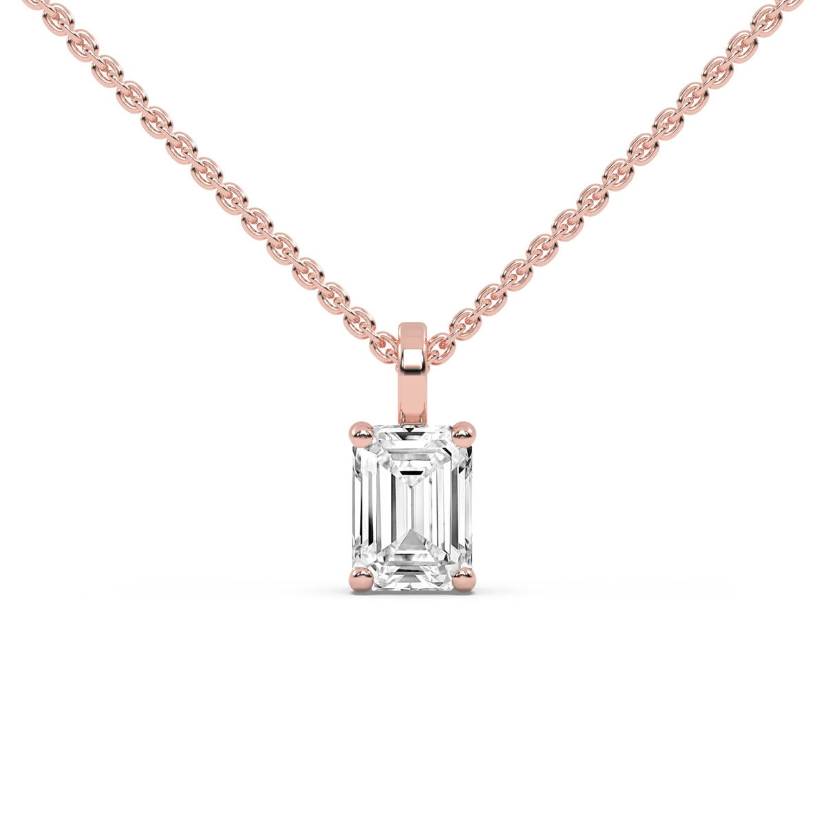 This rose gold pendant features an emerald-cut diamond set securely in a four-prong setting in rose gold