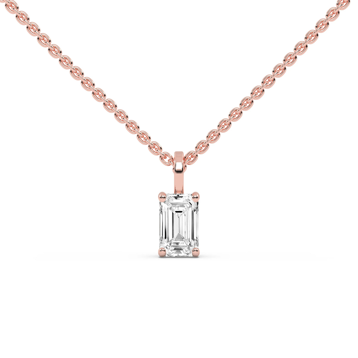 This rose gold pendant features an emerald-cut diamond set securely in a four-prong setting in rose gold