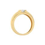 This yellow gold Tension set diamond solitaire ring, showcasing a solid gold band adorned with a stunning 0.50 Ct round brilliant-cut diamond at its center, elegantly secured in a tension setting in through finger view