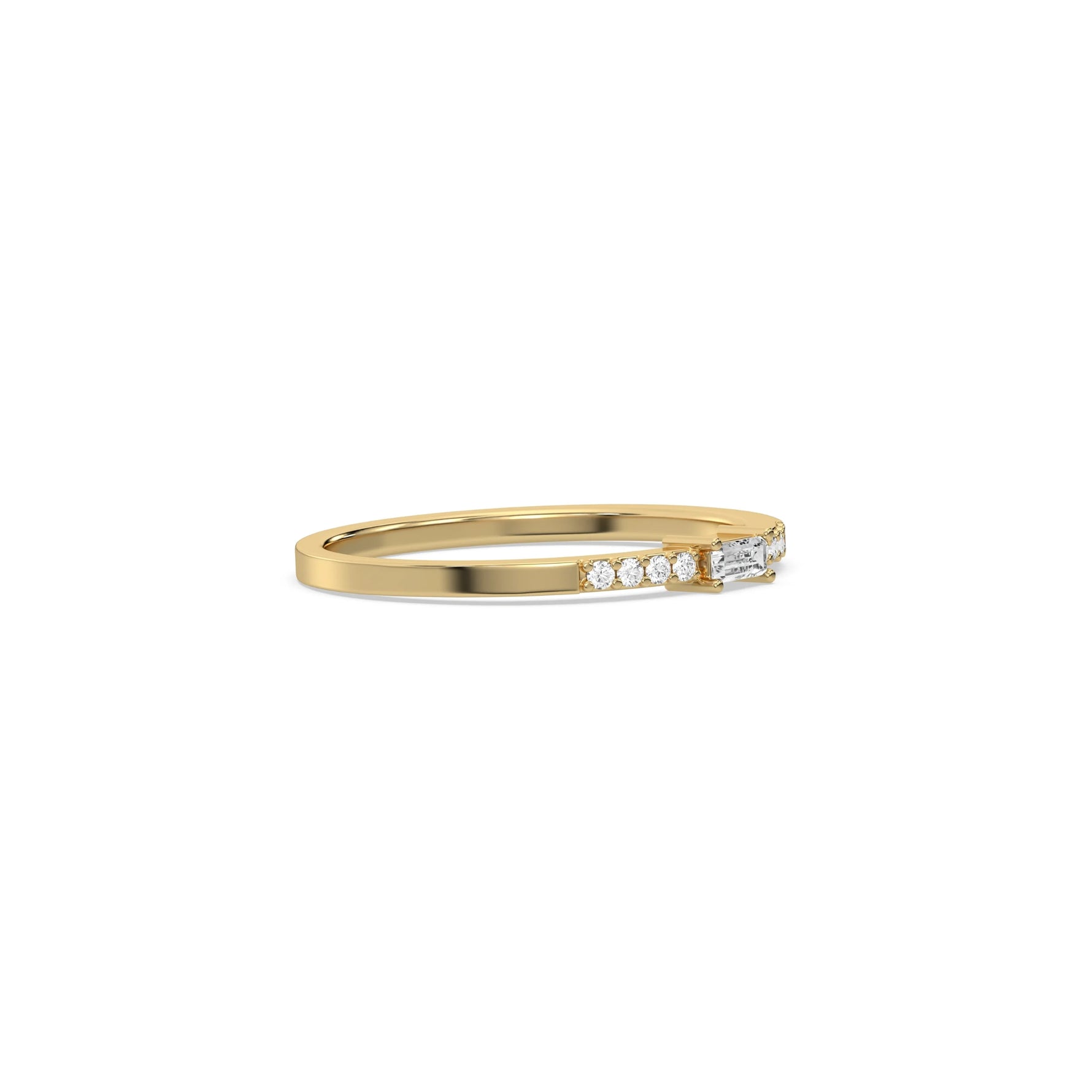 This yellow gold ring displayed on side view is made with baguette diamond in the center and flanked by three round brilliant-cut diamonds on each side