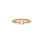 This rose gold ring displayed on front view is made with baguette solitaire diamond in bezel setting